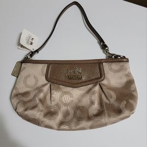 New Coach wristlet Signature in two tone Tan and brown color.
